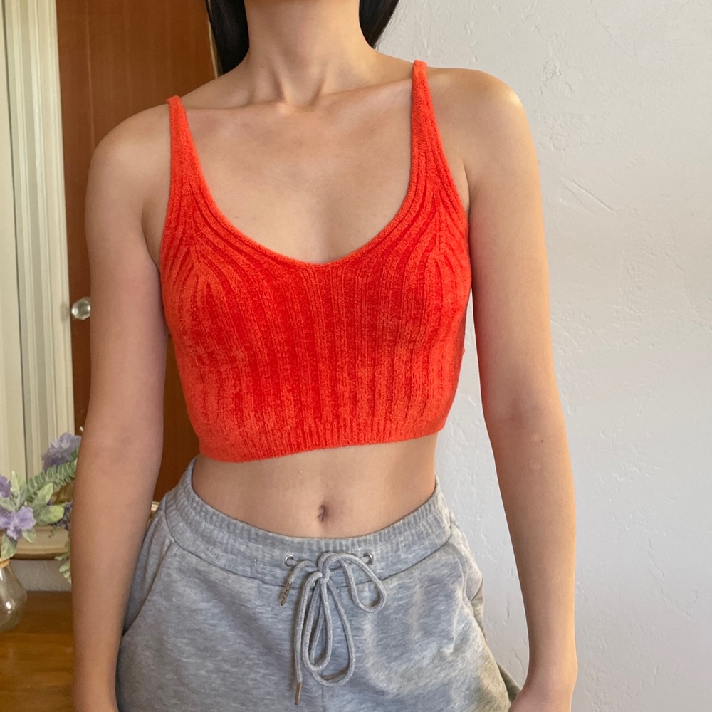 Urban outfitters silence + noise knit orange crop top.